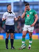 11 February 2024; Referee Luke Pearce speaks to the TMO before disallowing Ireland's fifrth try which was scored by Robbie Henshaw, not pictured, as Jack Crowley looks on during the Guinness Six Nations Rugby Championship match between Ireland and Italy at the Aviva Stadium in Dublin. Photo by Piaras Ó Mídheach/Sportsfile