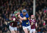 11 February 2024; Alan Tynan of Tipperary is tackled by Jack Grealish of Galway during the Allianz Hurling League Division 1 Group B match between Tipperary and Galway at FBD Semple Stadium in Thurles, Tipperary. Photo by Ray McManus/Sportsfile