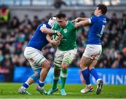 11 February 2024; Jack Conan of Ireland is tackled by Manuel Zuliani, left, and Paolo Garbisi of Italy during the Guinness Six Nations Rugby Championship match between Ireland and Italy at the Aviva Stadium in Dublin. Photo by Brendan Moran/Sportsfile