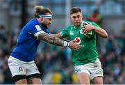 11 February 2024; Jack Crowley of Ireland is tackled by Federico Mori of Italy during the Guinness Six Nations Rugby Championship match between Ireland and Italy at the Aviva Stadium in Dublin. Photo by Brendan Moran/Sportsfile