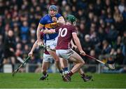 11 February 2024; Craig Morgan of Tipperary is tackled by Gavin Lee of Galway during the Allianz Hurling League Division 1 Group B match between Tipperary and Galway at FBD Semple Stadium in Thurles, Tipperary. Photo by Ray McManus/Sportsfile