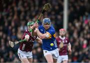 11 February 2024; Alan Tynan of Tipperary is tackled by Jack Grealish of Galway during the Allianz Hurling League Division 1 Group B match between Tipperary and Galway at FBD Semple Stadium in Thurles, Tipperary. Photo by Ray McManus/Sportsfile