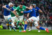 11 February 2024; Jack Conan of Ireland is tackled by Federico Ruzza of Italy during the Guinness Six Nations Rugby Championship match between Ireland and Italy at the Aviva Stadium in Dublin. Photo by Brendan Moran/Sportsfile