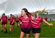 11 February 2024; University of Galway players Emily O'Connor, left, and Paige Foley celebrate  after their side's victory in the Electric Ireland Purcell Cup final match between University of Galway and SETU Carlow at University of Galway Connacht GAA AirDome in Bekan, Mayo. Photo by Sam Barnes/Sportsfile