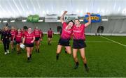 11 February 2024; University of Galway players Emily O'Connor, left, and Paige Foley celebrate  after their side's victory in the Electric Ireland Purcell Cup final match between University of Galway and SETU Carlow at University of Galway Connacht GAA AirDome in Bekan, Mayo. Photo by Sam Barnes/Sportsfile