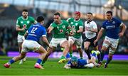 11 February 2024; James Lowe of Ireland in action against Tommaso Menoncello, 12, and Ross Vintcent of Italy during the Guinness Six Nations Rugby Championship match between Ireland and Italy at the Aviva Stadium in Dublin. Photo by Brendan Moran/Sportsfile