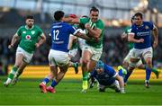 11 February 2024; James Lowe of Ireland in action against Tommaso Menoncello of Italy during the Guinness Six Nations Rugby Championship match between Ireland and Italy at the Aviva Stadium in Dublin. Photo by Brendan Moran/Sportsfile