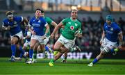 11 February 2024; James Lowe of Ireland beats the Italy defence during the Guinness Six Nations Rugby Championship match between Ireland and Italy at the Aviva Stadium in Dublin. Photo by Brendan Moran/Sportsfile