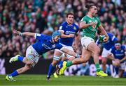 11 February 2024; James Lowe of Ireland in action against Ross Vintcent of Italy during the Guinness Six Nations Rugby Championship match between Ireland and Italy at the Aviva Stadium in Dublin. Photo by Piaras Ó Mídheach/Sportsfile