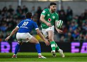 11 February 2024; Harry Byrne of Ireland in action against Paolo Garbisi of Italy during the Guinness Six Nations Rugby Championship match between Ireland and Italy at the Aviva Stadium in Dublin. Photo by Brendan Moran/Sportsfile