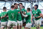 11 February 2024; Dan Sheehan of Ireland, centre, celebrates with team-mates including Andrew Porter, left, and Craig Casey, second from right, after scoring their side's fourth try during the Guinness Six Nations Rugby Championship match between Ireland and Italy at the Aviva Stadium in Dublin. Photo by Piaras Ó Mídheach/Sportsfile
