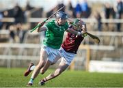 11 February 2024; David Reidy of Limerick in action against Mark Cunningham of Westmeath during the Allianz Hurling League Division 1 Group B match between Westmeath and Limerick at TEG Cusack Park in Mullingar, Westmeath. Photo by Michael P Ryan/Sportsfile