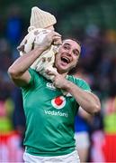 11 February 2024; James Lowe of Ireland with his son Nico after the Guinness Six Nations Rugby Championship match between Ireland and Italy at the Aviva Stadium in Dublin. Photo by Piaras Ó Mídheach/Sportsfile