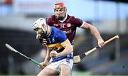 11 February 2024; Craig Morgan of Tipperary is tackled by Conor Whelan of Galway during the Allianz Hurling League Division 1 Group B match between Tipperary and Galway at FBD Semple Stadium in Thurles, Tipperary. Photo by Ray McManus/Sportsfile