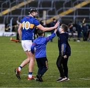 11 February 2024; Gearoid O'Connor of Tipperary with young supporters after the Allianz Hurling League Division 1 Group B match between Tipperary and Galway at FBD Semple Stadium in Thurles, Tipperary. Photo by Ray McManus/Sportsfile