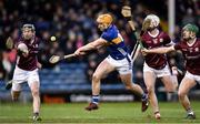 11 February 2024; Mark Kehoe of Tipperary has a shot on goal despite the attempts of, from left, Padraic Mannion, Darren Morrissey and Jack Grealish of Galway during the Allianz Hurling League Division 1 Group B match between Tipperary and Galway at FBD Semple Stadium in Thurles, Tipperary. Photo by Tom Beary/Sportsfile