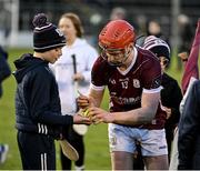 11 February 2024; Tom Monaghan of Galway signs a sliotar after the Allianz Hurling League Division 1 Group B match between Tipperary and Galway at FBD Semple Stadium in Thurles, Tipperary. Photo by Ray McManus/Sportsfile