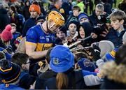 11 February 2024; Mark Kehoe of Tipperary signs autographs the Allianz Hurling League Division 1 Group B match between Tipperary and Galway at FBD Semple Stadium in Thurles, Tipperary. Photo by Ray McManus/Sportsfile