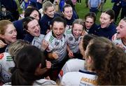 11 February 2024; University of Limerick players including Ailbhe Larkin, centre, celebrate after  their side's victory in the Electric Ireland Ashbourne Cup final match between University of Limerick and Technological University Dublin at University of Galway Connacht GAA AirDome in Bekan, Mayo. Photo by Sam Barnes/Sportsfile