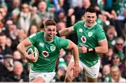 11 February 2024; Jack Crowley of Ireland runs in to score his side's first try during the Guinness Six Nations Rugby Championship match between Ireland and Italy at the Aviva Stadium in Dublin. Photo by Ben McShane/Sportsfile