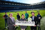 12 February 2024; In attandance at the GPA and Barnardos launch of their official charity partnership for 2024 in Croke Park, Dublin, are, from left, Chair of the GPA Board Brian MacCraith, Barnardos Ireland Chief Executive Officer Suzanne Connolly and GPA Chief Executive Tom Parsons, with players, from left, Cork hurler Seamus Harnedy, Dublin camogie player Aisling Maher, Mayo footballer Cillian O'Connor and Cavan ladies footballer Christina Charters. Photo by Ramsey Cardy/Sportsfile