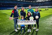 12 February 2024; In attandance at the GPA and Barnardos launch of their official charity partnership for 2024 in Croke Park, Dublin, are Leon Foy Hebib, age 6, and Nathalia Manning, age 8, with players, from left, Cork hurler Seamus Harnedy, Dublin camogie player Aisling Maher, Mayo footballer Cillian O'Connor and Cavan ladies footballer Christina Charters. Photo by Ramsey Cardy/Sportsfile