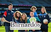 12 February 2024; In attandance at the GPA and Barnardos launch of their official charity partnership for 2024 in Croke Park, Dublin, are Nathalia Manning, age 8, and Leon Foy Hebib, age 6, with players, from left, Cork hurler Seamus Harnedy, Dublin camogie player Aisling Maher, Mayo footballer Cillian O'Connor and Cavan ladies footballer Christina Charters. Photo by Ramsey Cardy/Sportsfile