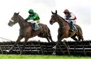 11 February 2024; Ashdale Flyer, left, with Jody McGarvey up, and Annalecka, right, with Danny Mullins up, during the Apple's Jade Mares Novice Hurdle at Navan Racecourse in Meath. Photo by Seb Daly/Sportsfile