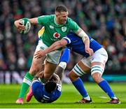 11 February 2024; Stuart McCloskey of Ireland is tackled by Monty Ioane, and Alessandro Izekor of Italy during the Guinness Six Nations Rugby Championship match between Ireland and Italy at the Aviva Stadium in Dublin. Photo by Brendan Moran/Sportsfile