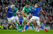 11 February 2024; Jack Conan of Ireland is tackled by Manuel Zuliani and Federico Ruzza of Italy during the Guinness Six Nations Rugby Championship match between Ireland and Italy at the Aviva Stadium in Dublin. Photo by Brendan Moran/Sportsfile