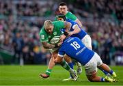 11 February 2024; Andrew Porter of Ireland is tackled by Giosue Zilocchi of Italy during the Guinness Six Nations Rugby Championship match between Ireland and Italy at the Aviva Stadium in Dublin. Photo by Brendan Moran/Sportsfile