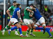 11 February 2024; Jeremy Loughman of Ireland is tackled by Federico Ruzza of Italy during the Guinness Six Nations Rugby Championship match between Ireland and Italy at the Aviva Stadium in Dublin. Photo by Brendan Moran/Sportsfile