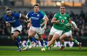 11 February 2024; James Lowe of Ireland makes a break during the Guinness Six Nations Rugby Championship match between Ireland and Italy at the Aviva Stadium in Dublin. Photo by Brendan Moran/Sportsfile