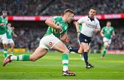 11 February 2024; Jack Crowley of Ireland on the way to scoring his side's first try during the Guinness Six Nations Rugby Championship match between Ireland and Italy at the Aviva Stadium in Dublin. Photo by Brendan Moran/Sportsfile