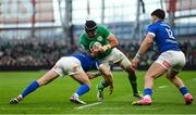 11 February 2024; Caelan Doris of Ireland is tackled by Paolo Garbisi and Tommaso Menoncello of Italy during the Guinness Six Nations Rugby Championship match between Ireland and Italy at the Aviva Stadium in Dublin. Photo by Brendan Moran/Sportsfile