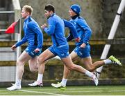 12 February 2024; Ross Byrne, centre, with Jamie Osborne, left, and Sam Prendergast during a training session on the Leinster Rugby 12 County Tour at Mullingar RFC in Westmeath. Photo by Harry Murphy/Sportsfile