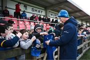 12 February 2024; Head coach Leo Cullen signs autographs during an open training session on the Leinster Rugby 12 County Tour at Mullingar RFC in Westmeath. Photo by Harry Murphy/Sportsfile