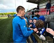 12 February 2024; Sam Prendergast signs autographs after an open training session on the Leinster Rugby 12 County Tour at Mullingar RFC in Westmeath. Photo by Harry Murphy/Sportsfile