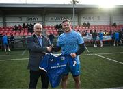 12 February 2024; Scott Penny presents a jersey to Mullingar RFC president Conal Fitzgerald after an open training session on the Leinster Rugby 12 County Tour at Mullingar RFC in Westmeath. Photo by Harry Murphy/Sportsfile