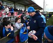 12 February 2024; Head coach Leo Cullen signs autographs after an open training session on the Leinster Rugby 12 County Tour at Mullingar RFC in Westmeath. Photo by Harry Murphy/Sportsfile