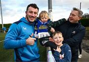 12 February 2024; Will Connors with Leinster supporters Ethan, aged five, Dillon, aged nine, and John Fitzpatrick after an open training session on the Leinster Rugby 12 County Tour at Mullingar RFC in Westmeath. Photo by Harry Murphy/Sportsfile
