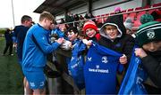 12 February 2024; Andrew Osborne signs autographs as supporters wait after an open training session on the Leinster Rugby 12 County Tour at Mullingar RFC in Westmeath. Photo by Harry Murphy/Sportsfile