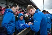 12 February 2024; Jamie Osborne signs autographs after an open training session on the Leinster Rugby 12 County Tour at Mullingar RFC in Westmeath. Photo by Harry Murphy/Sportsfile