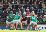 11 February 2024; Michael Daly of Westmeath in action against Limerick players from left, Darragh Langan, and Tom Morrissey during the Allianz Hurling League Division 1 Group B match between Westmeath and Limerick at TEG Cusack Park in Mullingar, Westmeath. Photo by Michael P Ryan/Sportsfile