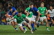 9 February 2024; Ben O'Connor of Ireland in action against Lorenzo Elettri of Italy during the U20 Six Nations Rugby Championship match between Ireland and Italy at Virgin Media Park in Cork. Photo by Brendan Moran/Sportsfile