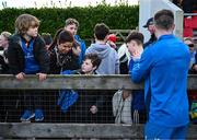12 February 2024; Leinster supporter Theo Maybury, aged four, from Mullingar, Westemath, left, waits for players after an open training session on the Leinster Rugby 12 County Tour at Mullingar RFC in Westmeath. Photo by Harry Murphy/Sportsfile