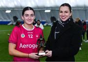 11 February 2024; Tegan Canning of University of Galway is presented with the Electric Ireland Player of the Match award by Aiste Petraityte, Electric Ireland Brand and Sponsorship Manager following her performance in the Electric Ireland Purcell Cup final match between University of Galway and SETU Carlow at University of Galway Connacht GAA AirDome in Bekan, Mayo. #FirstClassRivals Photo by Sam Barnes/Sportsfile