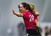 11 February 2024; University of Galway players Maoiloisa Walsh, 24, and Sarah Lyons celebrate after their side's victory in the Electric Ireland Purcell Cup final match between University of Galway and SETU Carlow at University of Galway Connacht GAA AirDome in Bekan, Mayo. Photo by Sam Barnes/Sportsfile