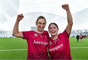 11 February 2024; University of Galway players Alannah Kelly, left, and Niamh McPeake celebrate after their side's victory in the Electric Ireland Purcell Cup final match between University of Galway and SETU Carlow at University of Galway Connacht GAA AirDome in Bekan, Mayo. Photo by Sam Barnes/Sportsfile