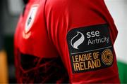 13 February 2024; A detailed view of the SSE Airtricity League of Ireland First Division sleeve badge on the Longford Town jersey during a Longford Town FC squad portraits session at John Hyland Park in Baldonnell, Dublin. Photo by Stephen McCarthy/Sportsfile